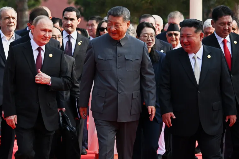 From left, Russian President Vladimir Putin, Chinese President Xi Jinping and North Korean leader Kim Jong Un arrive at a military parade to commemorate the 80th anniversary of Japan's World War II surrender in Beijing on September 3, 2025 [Sergei Bobylev/Sputnik via AP Photo]